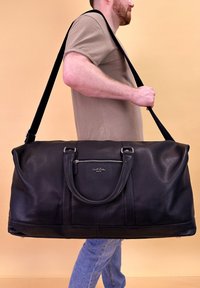 Дорожная сумка