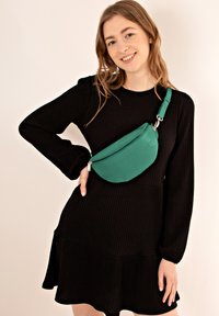 Сумка на пояс Сумка на пояс