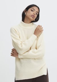 Длинный пуловер