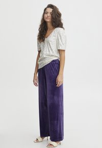 Широкие брюки Широкие брюки