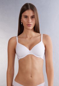 Бюстгальтер на косточках