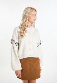 Жаккардовая вязаная кофта