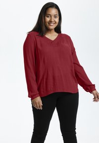 Длинная блузка