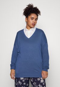 Длинный пуловер