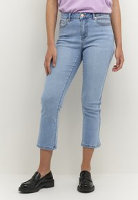 Клешеные джинсы Клешеные джинсы