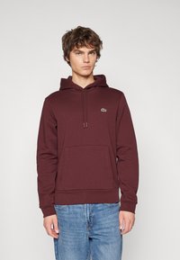 Пуловер с капюшоном