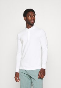 Поло с длинным рукавом Поло с длинным рукавом