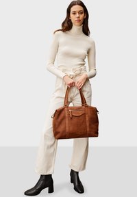 Кожаная сумка