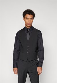 Жилет Жилет