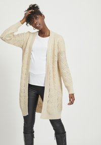 Жаккардовая вязаная кофта