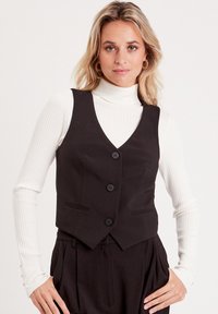 Жилет Жилет