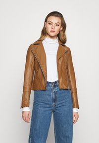 Байкерская куртка Байкерская куртка