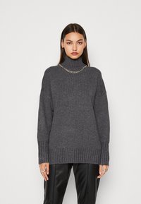 Длинный пуловер