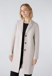 Шерстяное пальто