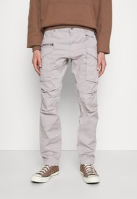 Брюки с накладными карманами Брюки с накладными карманами