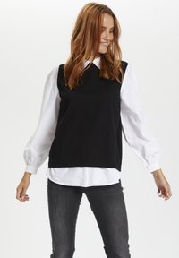 Пуловер без рукавов Пуловер без рукавов