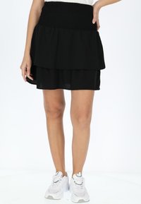 Юбка с воланами