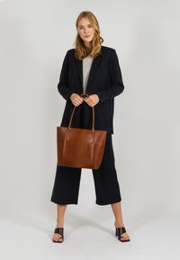 Кожаная сумка