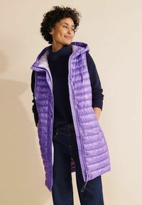 Длинный жилет