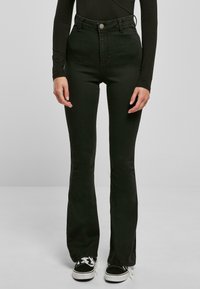 Клешеные джинсы