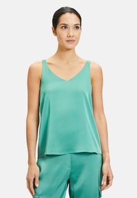 Блузка без рукавов