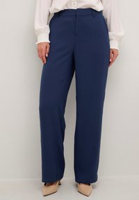 Широкие брюки Широкие брюки