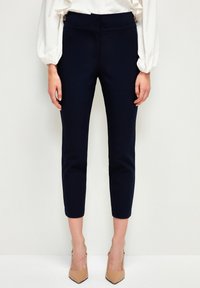 Узкие брюки