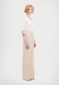 Прямые брюки Прямые брюки