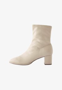 Широкие сапоги