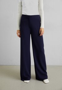 Широкие брюки Широкие брюки