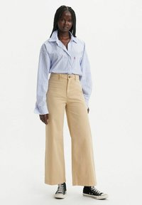 Широкие брюки Широкие брюки