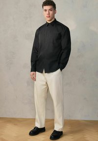 Костюмные брюки Костюмные брюки