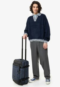 Чемодан на колесах