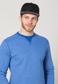 Кепка Кепка