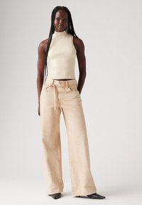 Свободные джинсы Свободные джинсы