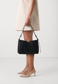 Кожаная сумка