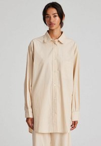 Длинная блузка Длинная блузка