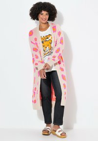 Длинный жилет