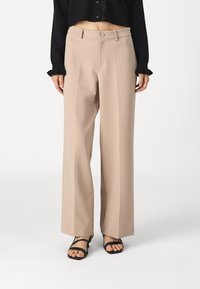 Широкие брюки Широкие брюки