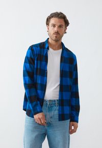 Фланелевая рубашка Фланелевая рубашка