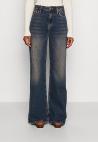 Свободные джинсы