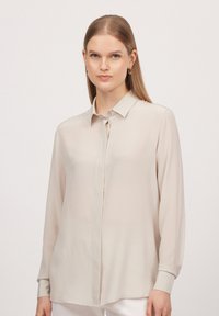 Шелковая блузка