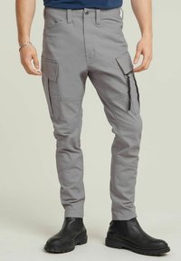 Брюки с накладными карманами