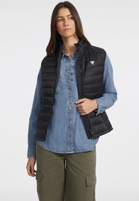 Стеганый жилет Стеганый жилет