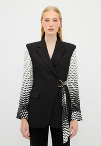 Джинсовая жилетка