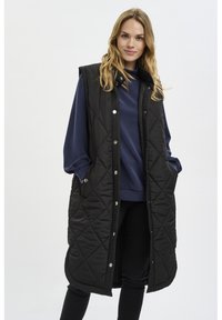 Длинный жилет Длинный жилет