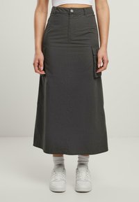 Юбка с накладными карманами