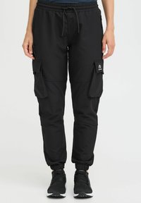 Брюки с накладными карманами Брюки с накладными карманами