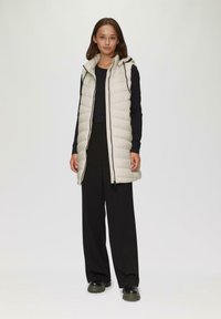 Стеганый жилет Стеганый жилет