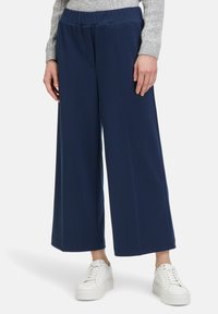 Широкие брюки Широкие брюки